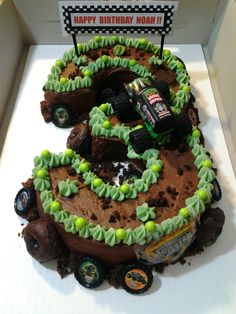 a monster truck birthday cake in a box