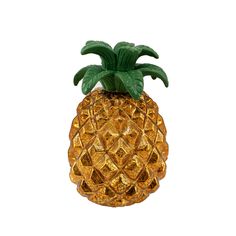 a golden pineapple shaped object on a white background