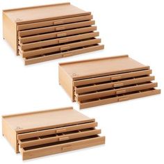 three wooden drawers with dividers on each side