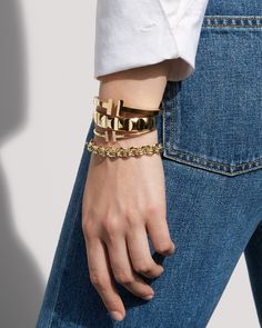 Compliment your favorite blue jeans with graphic gold accents! #tiffany&co #goldbracelets Vanessa Traina, Creative Jewelry Photography, Jewelry Photography Styling, Tiffany Bracelets, Jewelry Photoshoot, Graphic Style, Style Edit, Gold Bracelets, Jewelry Model