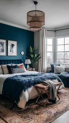 a bed room with a neatly made bed next to a window and a rug on the floor