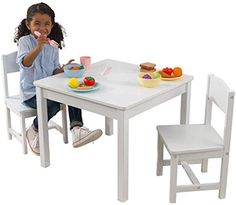 As darling in the dining room as in your child's bedroom, this Aspen table and chair set offers little ones a place to sit that's just their size. It'll soon become the favorite place for doing art projects, having snacks and more. Set includes a table and 2 chairs. Quality constructed from hardwood. Imported. Table: 19Hx24Wx24D". Includes two matching chairs Toddler Table And Chairs, Toddler Table, Sand And Water Table, Table And Chair Set, Kids Table And Chairs, Matching Chairs, Table And Chair, Table 2, Kids Wood