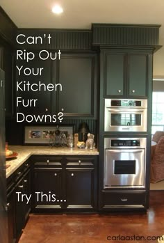 the kitchen cabinets are painted black and have white lettering that says can't rip out your kitchen fur downs? try this