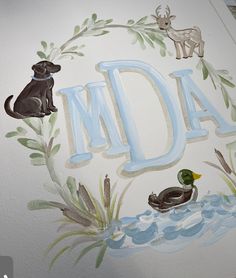 a painted wall with the letter dm and two ducks in front of an image of a dog