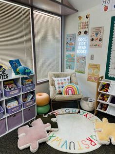 a child's room with toys and books on the floor