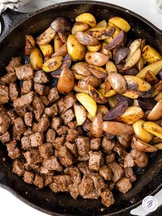 steak and potatoes in a cast iron skillet