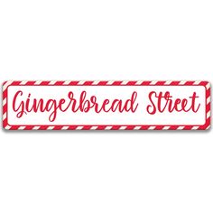 the gingerbread street sign is red and white with candy canes on it's side