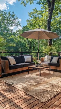 Serene outdoor patio with plush seating, stylish umbrella, and lush greenery. Ideal for relaxation and gatherings.