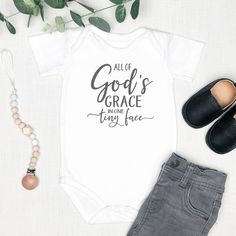 All of God’s Grace in One Tiny Face Infant Onesie | Baptism Gift | Christian Baby Gift Printify Newborn Onesie Ideas, Christian Baby Shower Ideas, Christian Baby Onesies, Christian Onesies, Baby Onesie Ideas, Baby Onesies Diy, Christian Baby Shower, Onesie Ideas, Auntie Era