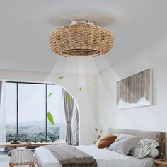 a bedroom with white walls and flooring has a large window that looks out onto the countryside