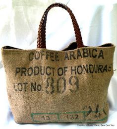 a brown bag with writing on it sitting on top of a white table next to a wall