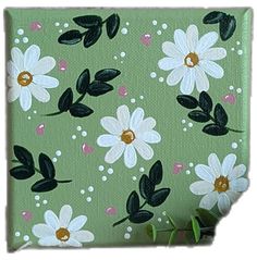 a painting of white flowers and green leaves on a light green background with polka dots