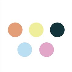 four different colored circles on a white background