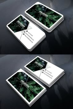 three business cards with green plants on the front and back, both in black and white