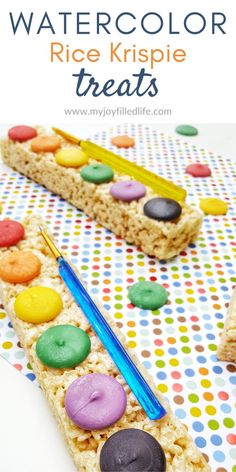 rice krispie treats are decorated with colorful candy and sprinkles for a fun treat