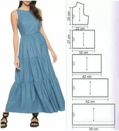 a woman in a blue dress is standing next to the measurements for her size chart