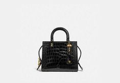 Rogue Bag 25 In Alligator | COACH Large Wallet, Monogrammed Items, Coach Swagger Bag, New Handbags, Belt Bag, Stuart Weitzman, Alligator, The Dreamers, The Original