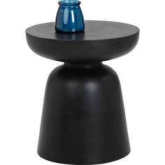 a black table with a blue vase on top