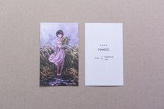 a card with a painting of a girl holding flowers