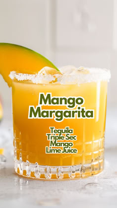 Mango Margarita Mango Margaritas, Mango Margarita Recipe, Frozen Mango Margarita, Fruity Cocktail, Margarita On The Rocks, Tequila Cocktail, Mango Margarita, Fruity Cocktails, Margarita Recipe