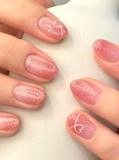 Korean valentines day nails: pink glitter ombre with heart accents Pink Valentines Nails Designs Short, Valentines Nails Natural Nail Short, Blush Nail Art Designs, Pretty Nails For Short Nails, Nail Art Valentines Day Simple, Valentine Nail Designs For Short Nails, Valentine’s Day Gel Nails Short, Simple Valentine Nails Designs, Valentines Nail Art Designs Short