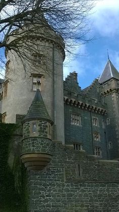 an old castle with a tall clock tower