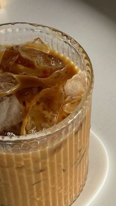 an iced drink in a glass with ice cubes