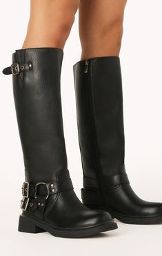 Take your style to new heights with this edgy take on a classic combat boot featuring statement buckle detailing. Tall Boots With Buckles, Fall And Winter Boots, Groomsmen Accessories, Black Moto Boots, Closet Aesthetic, Maternity Bridesmaid Dresses, Bride Bag, Shoes For Leggings, Denim Sweater