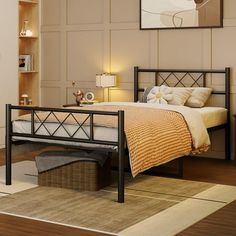 a bed room with a neatly made bed next to a night stand and a book shelf