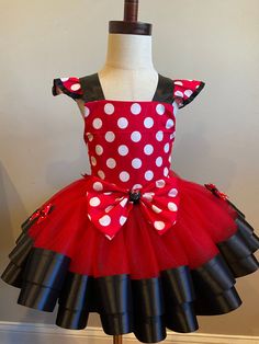 Minnie Mouse Birthday Tutu outfit/ 1st Birthday Tutu Set/ Minnie Mouse Birthday Tutu Dress/ D Personalized Tutu Outfit/ Birthday Shirt 7 days processing time plus add 3-6 days for shipping. We specialize in making extra full & extra fluffy tutu outfits, they are made with layers of high quality tulle and ribbon. The shirts that we use to elaborate our outfits are 100% Cotton and are boutique quality shirts they are thick, very soft and they run true to size, please see the size chart before purchasing.This shirt design is made using heat tranfer vinyl that is adhered to the shirt using a professional grade heat press machine. The bow can be attached on an elastic band or hairclip to match the set, please let me know on the personalization section how would you want it. RETURNS RETURNS are Minnie Mouse Tutu Outfit, Minnie Mouse Tutu, Mickey Mouse Costume, Birthday Tutu Dress, 1st Birthday Tutu, Outfit Birthday, Mouse Costume, Birthday Tutu Outfit, Toddler Costumes