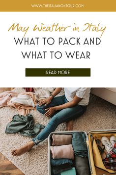 a woman sitting on the floor next to an open suitcase with clothes and shoes in it