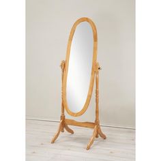 a wooden stand with a large mirror on it's legs and an oak frame