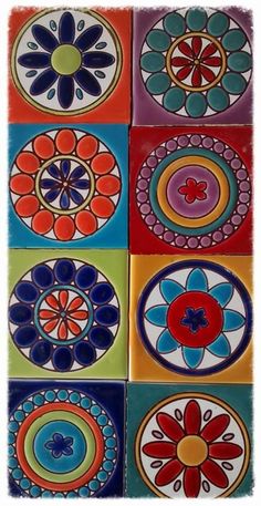 a colorful tile with many different designs on the tiles, including flowers and circles in various colors