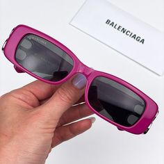 Balenciaga Bb0096s 016 Sunglasses Fuchsia Purple Silver Logo Rectangle Unisex Brand: Balenciaga Model: Bb0096s Color Code: 016 Gender: Unisex Year: 2023 Frame Colour: Fuchsia Purple Silver Logo Frame Shape: Rectangle Frame Style: Full Rim Frame Material: Recycled Acetate Lens Material: Plastic Lens Color: Grey Lens Protection: Category 3 Size: 51x18x130 100% Uv Protection Made In Italy. Full Retail Package With All Accessories: Case, Cloth And All Paperwork. 100% Authentic! Logo Frame, Fuchsia Purple, Silver Sunglasses, Grey Sunglasses, Balenciaga Black, Rectangle Frame, Black Rectangle, Butterfly Sunglasses