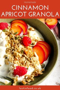 a bowl filled with yogurt, granola and strawberries next to sliced peaches