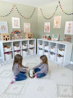 Playroom organization and toy storage. #playroom #playroomgoals #playroomorganization #toystorageideas #toyorganization #toyorganizationideas Playroom With Kitchen Set, Bedroom And Toy Room Combo, Doll Storage Playroom, Toy Shelf Organization Playroom, Toy Room Cube Storage, Cube Organizer Toy Storage, Playroom Storage Cubes, Living Room With Toy Storage, Cube Shelf Organization