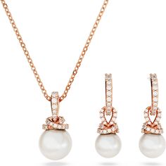 This hoop earrings and pendant set is the perfect way to add some timeless beauty to your style. Each rose gold-tone plated piece features a radiant Swarovski Crystal Pearl accented with a shimmering pavé of clear Swarovski Zirconia. Classic yet modern all at once, this is an essential combination of pearls for any jewelry collection. Swarovski Necklace, Rose Jewelry, Swarovski Jewelry, Stunning Necklace, Bangles Jewelry, Necklace And Earrings, Crystal Pearls, Pearl Drop Earrings, White Rose Gold