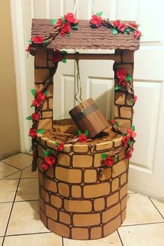 Charming cardboard wishing well decor for Christmas Snow White Props Diy, Snow White Wishing Well Diy, Snow White House Decor, Snow White Homecoming Float, Snow White Office Decorations, Snow White Parade Float Ideas, Trunk Or Treat Snow White Theme, Snow White Decorations Ideas, Snow White Christmas Decorations