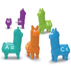 four different colored llamas are shown in the shape of letters and numbers,