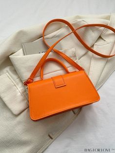 BagForLove - Compact Orange Flap Bag with Delicate Stitching - Perfect for Everyday Use Product Description Color Orange Type Square Bag Bag Size Small Strap Type Top Handle Pattern Type Plain Closure Type Magnet Style Fashionable Features Lightweight Coating 100% Polyurethane Composition 100% Polyurethane Material PU Leather Size Chart INCH CM Strap Length Bag Length Bag Width Bag Height Handle Height 47.2 inch 8.7 inch 3 inch 4.7 inch 2.8 inch Strap Length Bag Length Bag Width Bag Height Handl Rectangular Box Bag For School, Rectangular Satchel For School In Spring, Rectangular Spring School Satchel, Orange Box Bag For Travel, Orange Bags For Daily Use, School Square Baguette Bag, Square Baguette Bag For School, Everyday Orange Bag, School Box Bag With Detachable Strap