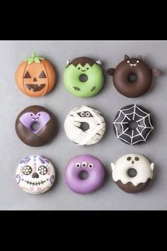 there are many donuts with different designs on them