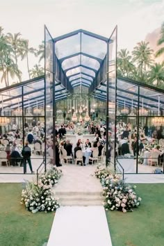 Elegant glass pavilion wedding reception surrounded by lush greenery and softly lit chandeliers. Transparent Tent Wedding, Clear Wedding Tent, Clear Top Tent Wedding, Wedding Tent Reception, Pavilion Wedding Reception, Wedding Tent Lighting, Transparent Tent, Summer Table Centerpieces, Wedding Tent Decor