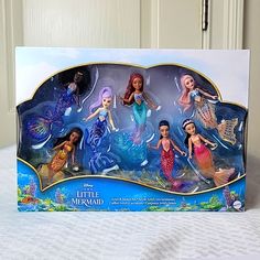 the little mermaid doll set is in its box