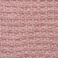 the crochet stitchs on this blanket are very soft and light coral pink