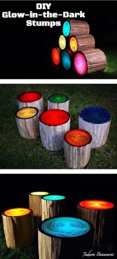 several different types of lights that are on wood logs and in the grass, lit up at night