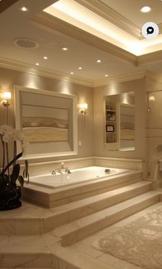 a large bathroom with two sinks and a bathtub