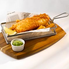 fish and chips are served on a tray