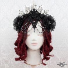 You'll be the queen of the night in this beautiful gothic Vampire crown.  It's a stunningly detailed piece - with layered venice lace appliques in front, draping crystal-cut glass beads. and flowers of varying textures - soft crystal organza and shining satin. - .v. - About my Crowns - .,_.^._,. - When I first started my business way back in 2006, I made headdresses for belly dancers.  They were designed to be easy to place (for quick costume changes) and they had to stay put too - thru twirls, shimmies, and more. Today, I use the same techniques to make my crowns.  The end result is a piece that goes on incredibly easily, and stays put perfectly thru all your costumed adventures. .v. --- Costume --- .,_.^._,. Do you like the full costume in the final photo?  Purchase it here: https://www. Gothic Tall Crown For Costume, Gothic Crown With Round Crown For Festival, Gothic Tall Crown For Festivals, Gothic Crown For Festivals With Round Crown, Gothic Round Crown For Festival, Gothic Crown Headpiece For Masquerade, Gothic Crown For Halloween Party, Gothic Halloween Party Crown, Gothic Crown With Tall Shape For Party