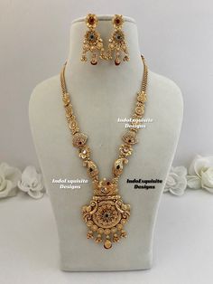 Matt gold finish Raani Haar(long necklace) comes with Earrings/bridal jewellery/south Indian long necklace Set/Rajwadi Rani Haar/Guttapusalu necklace/ one 1 gram gold/Ruby Green  All items are shipped from Brampton, Ontario, Canada. If you need your item by a certain day, please reach out to us for express delivery option before placing the order so that we can update the shipping for you. Standard shipping/delivery timeline Below are the estimated delivery times after the order is shipped/dispatched.  ---> USA delivery timeline * 3-5  business days to major urban centers in USA. It may take 2-3 days extra to remote locations ---> Canada delivery timeline  * 2-3 business days - GTA  & Montreal  * 2-4  business days - Rest of Ontario/Quebec * 4-6 business days-  Rest of Canada (Please consi South Indian Long Necklace Gold, Luxury Kundan Temple Necklace In Yellow Gold, Cheap Traditional Long Necklace, Rani Haar Long Necklaces Gold Indian Jewelry Jewellery Designs, Luxury Gold Temple Necklace With Elegant Design, Luxury 22k Gold Bridal Necklace With Stone Work, Luxury Gold Temple Necklace For Diwali, Temple Gold Jewellery, Long Necklace Gold Indian Bridal