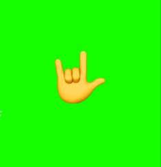 an orange hand making the v sign on a green screen with a white bird flying by